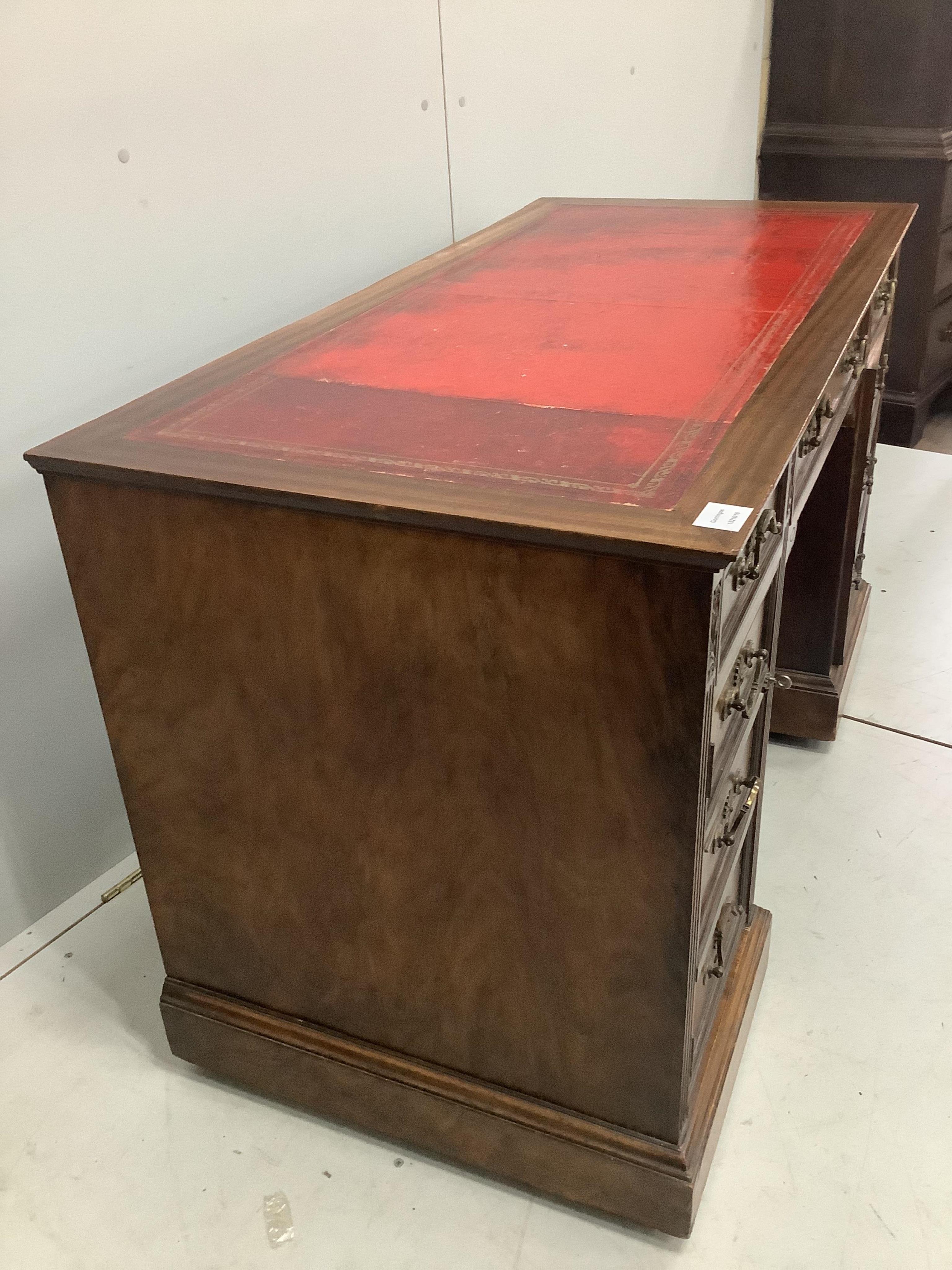 A late Victorian mahogany kneehole desk, width 120cm, depth 59cm, height 74cm. Condition - fair